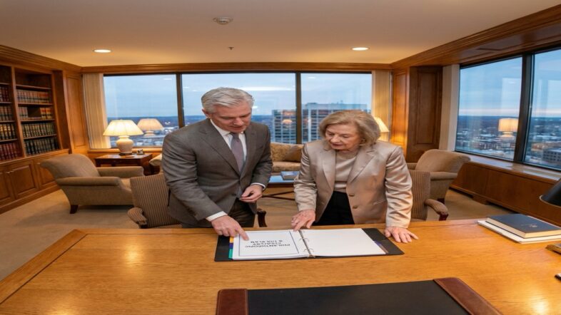 Wealthy founder and tax strategist discussing long-term philanthropic planning and foundation tax benefits in a private office